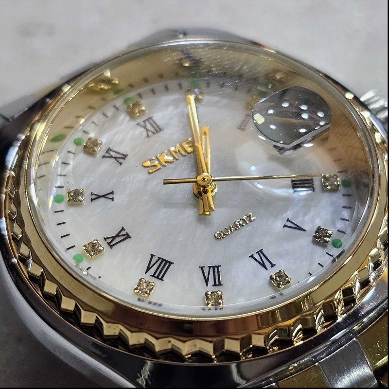 ساعت مچی عقربه ای مردانه اسکمی مدل 9098 کد 08