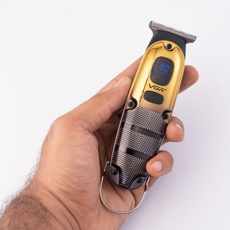 ماشین اصلاح موی صورت وی جی ار مدل V-981 با تیغه استیل ضد زنگ، عملکرد توربو، طراحی ارگونومیک، شارژ سریع 90 دقیقه و است...